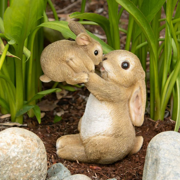 playful mom and baby rabbit figurine