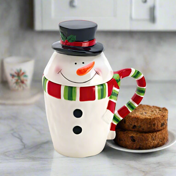 snowman covered tea and beverage mug
