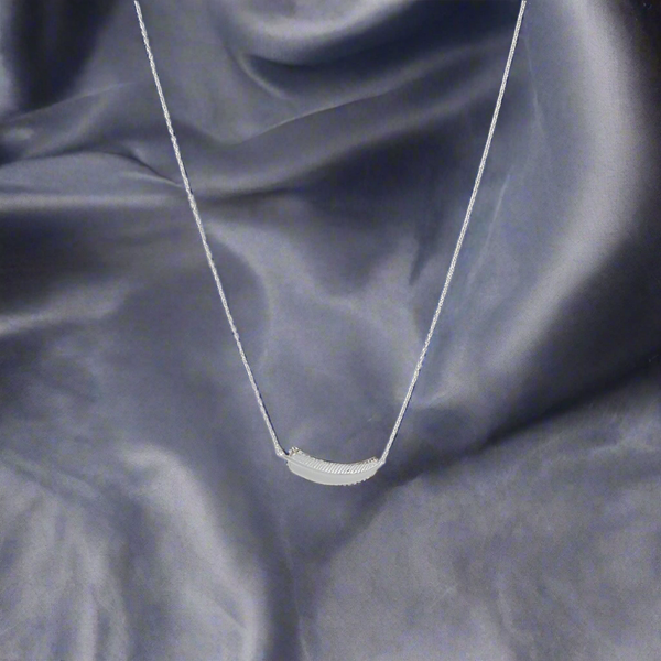 tiny sideways sterling silver feather necklace