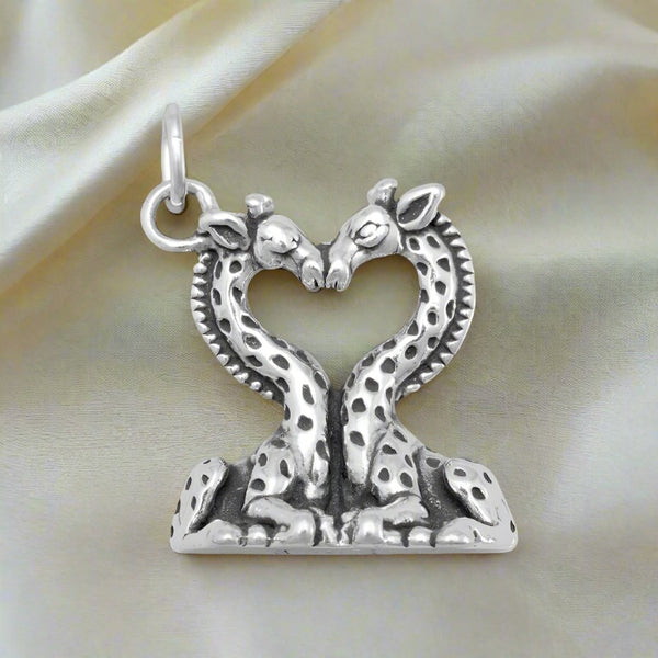 sterling silver heart shaped kissing giraffes charm pendant
