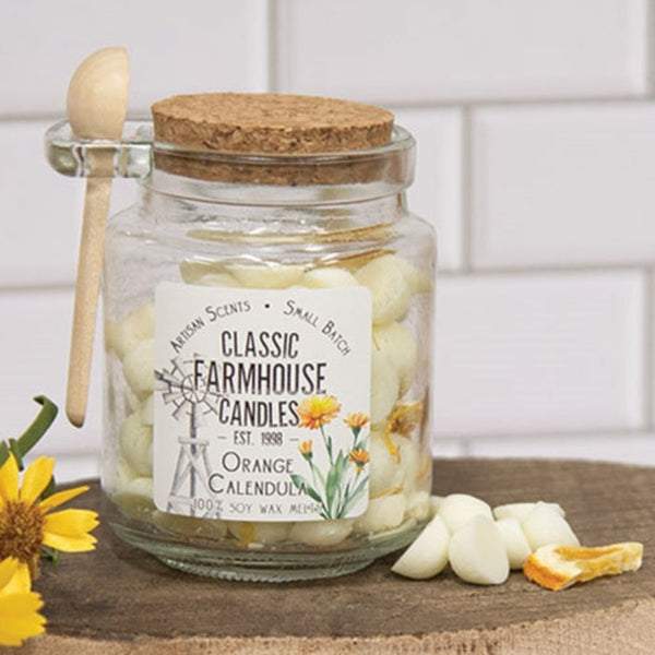 orange calendula gumdrop soy wax melts jar with spoon