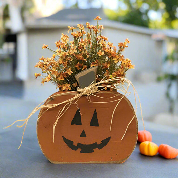 rustic wood jack-o-lantern planter