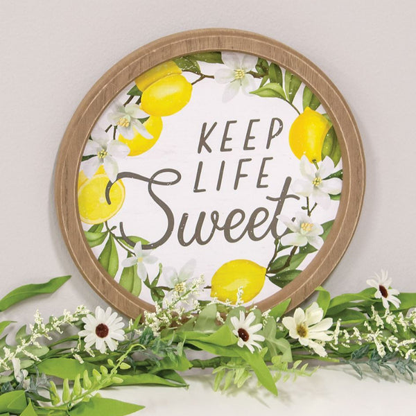 keep life sweet round framed lemon sign