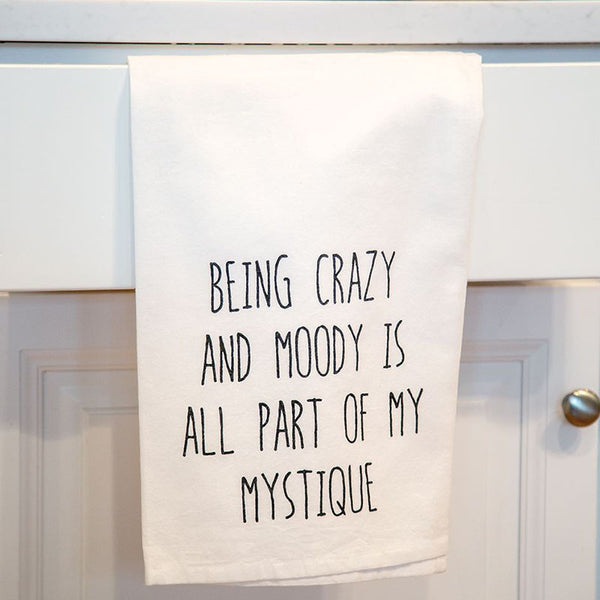 being crazy and moody is all part of my mystique kitchen tea towel