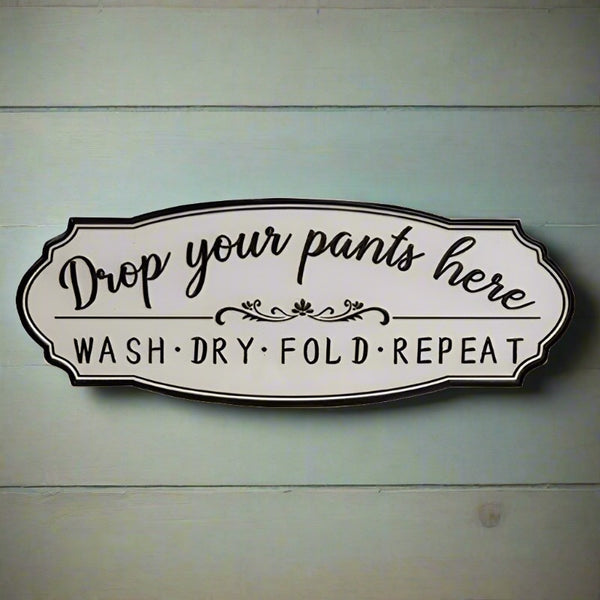 drop your pants here laundry sign