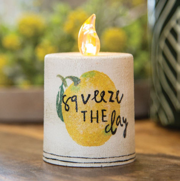 squeeze the day lemon day timer pillar candle
