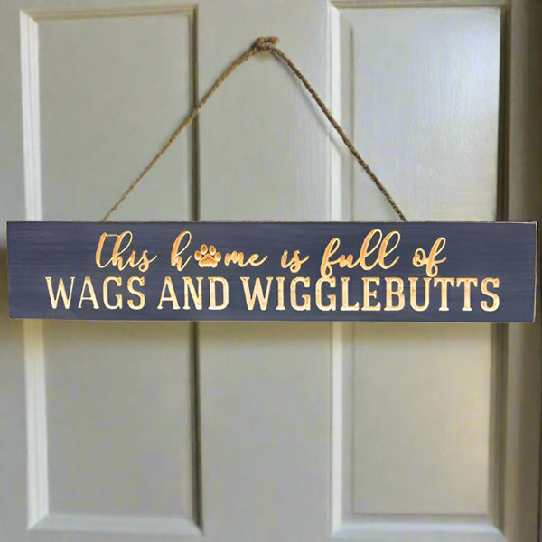 this home is full of wags and wigglebutts sign