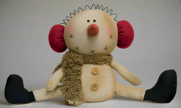 sitting snowman with earmuffs figurine