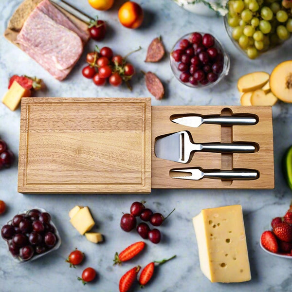 channeled wooden cheeseboard with utensils