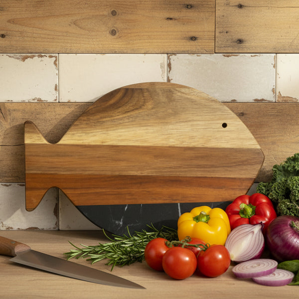 black marble and acacia wood fish cutting board