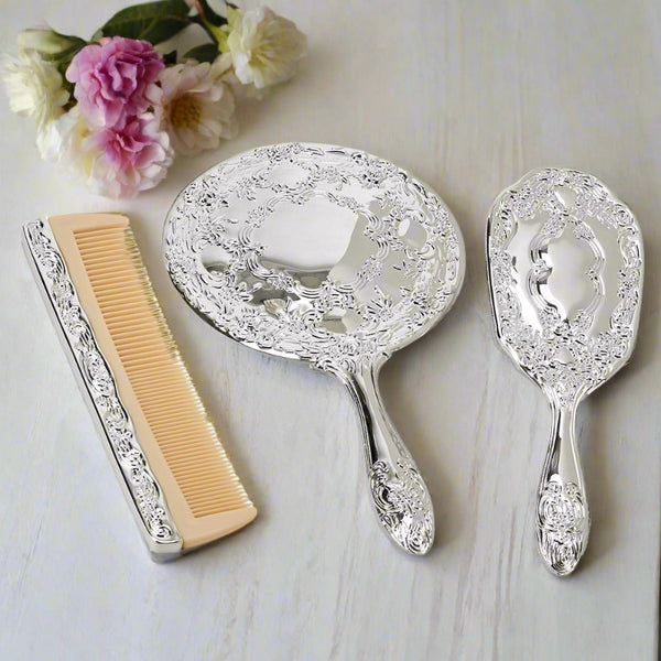 ornate comb brush and mirror vanity set