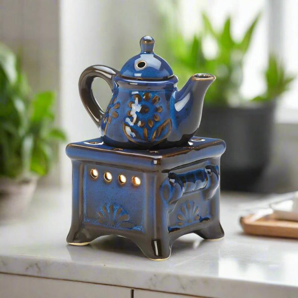 blue teapot stove oil warmer