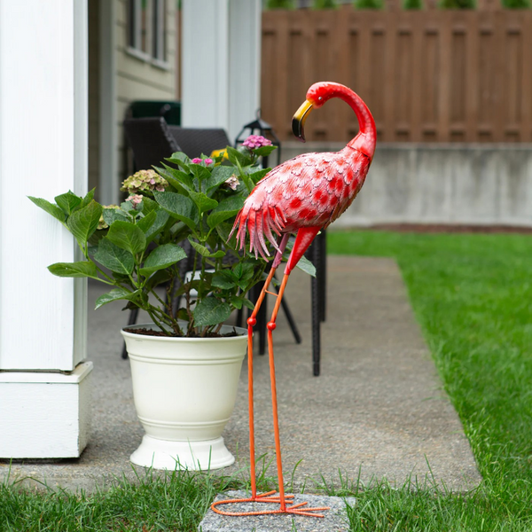 looking back flamingo garden stake