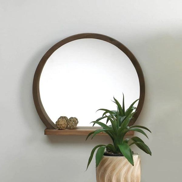 round wooden mirror with shelf