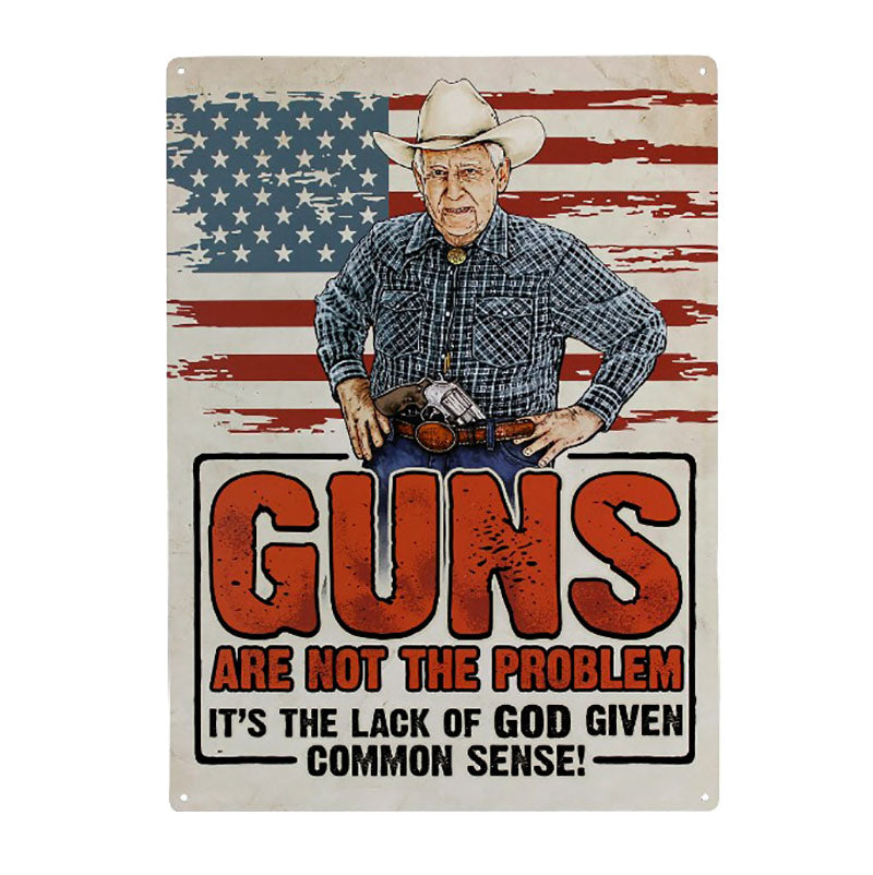guns are not the problem tin sign
