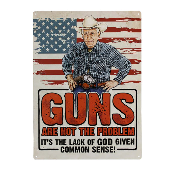 guns are not the problem tin sign