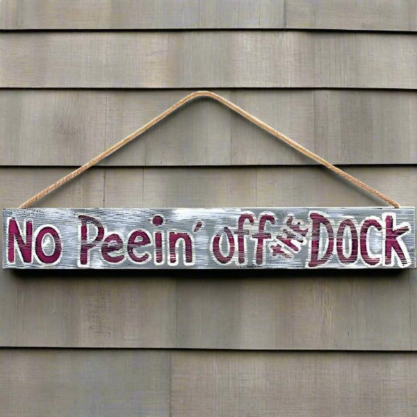 no peein off the dock warning sign