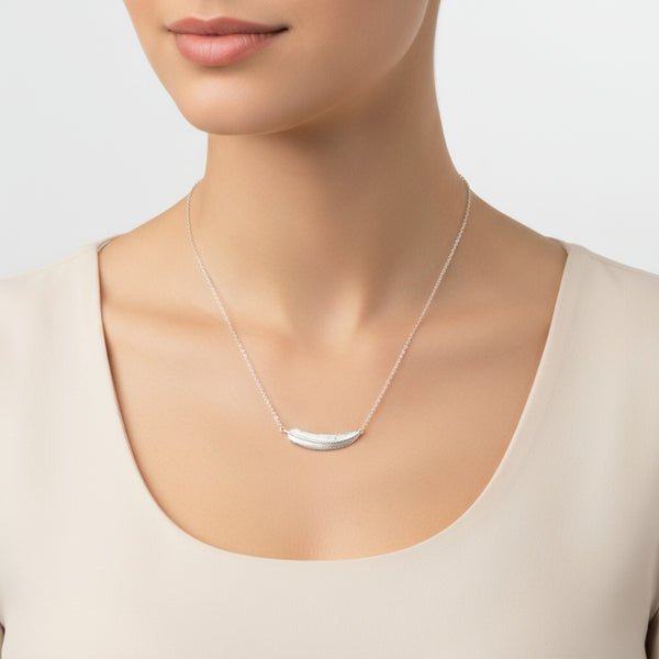 tiny sideways sterling silver feather necklace