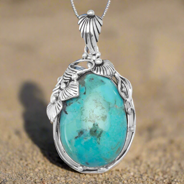 oval reconstituted turquoise pendant