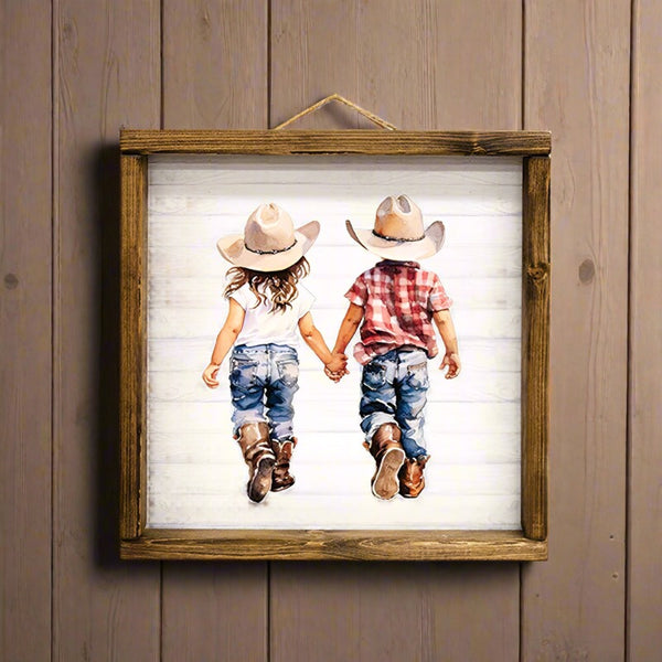 little cowboy and cowgirl framed art print