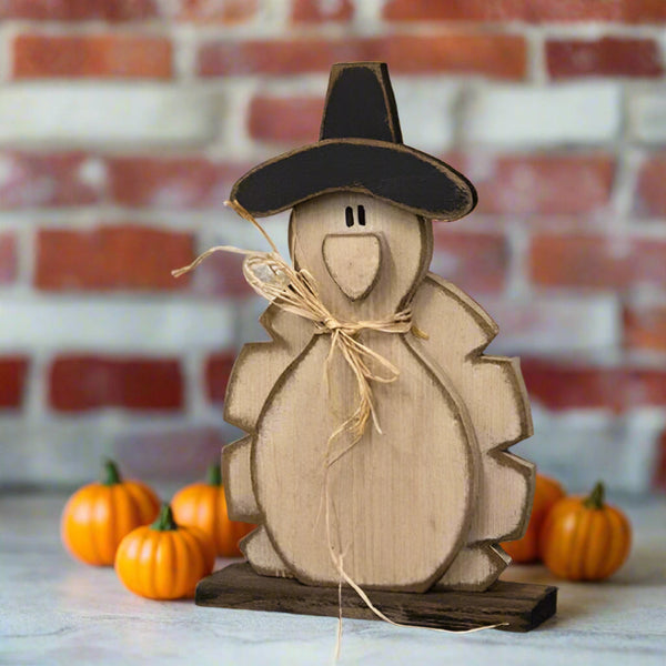 rustic wooden pilgrim turkey on base