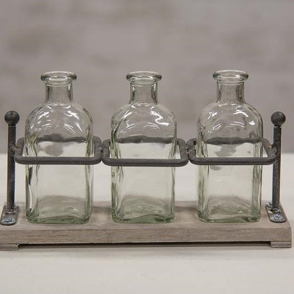 wood and iron bottle holder with vases