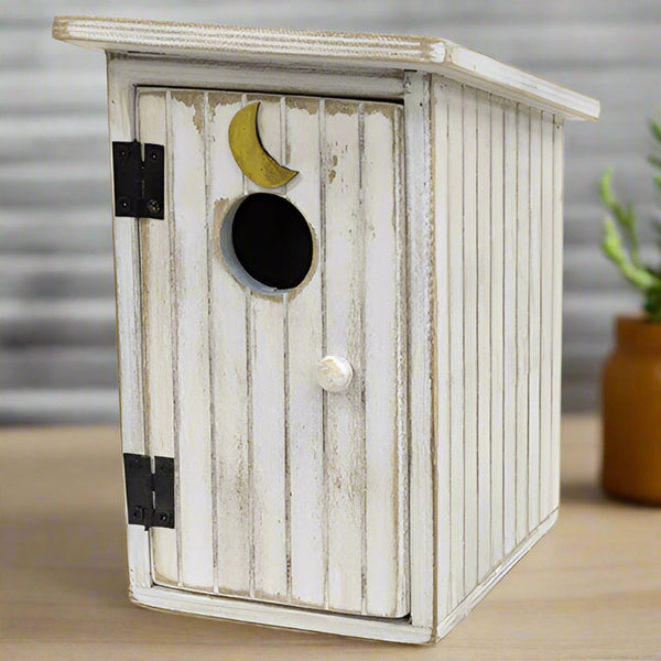 the white outhouse wooden shelf sitter