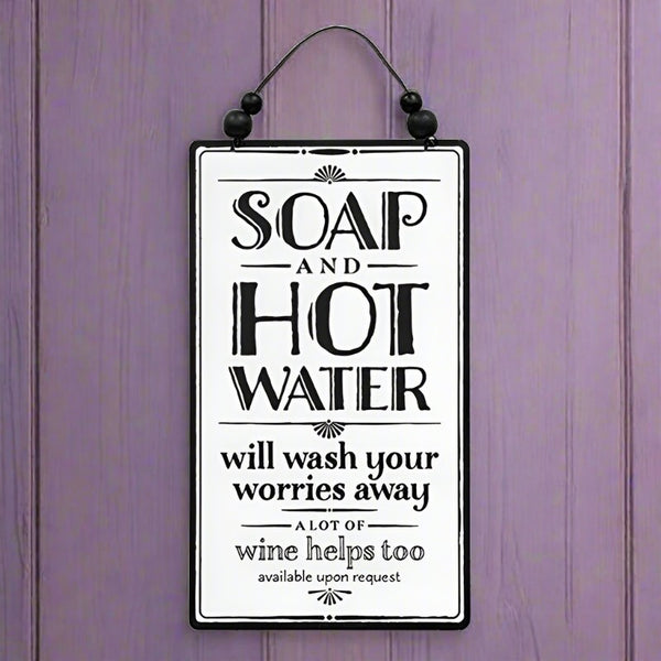soap and hot water laundry room sign