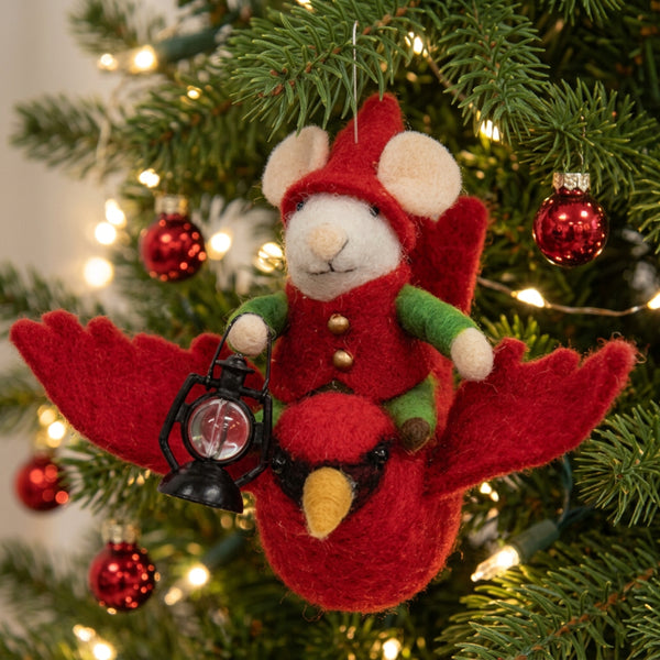 mouse on a flying cardinal ornament