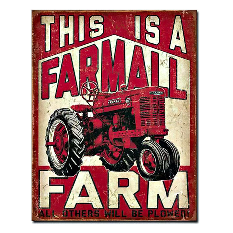 this is a farmall farm tin sign