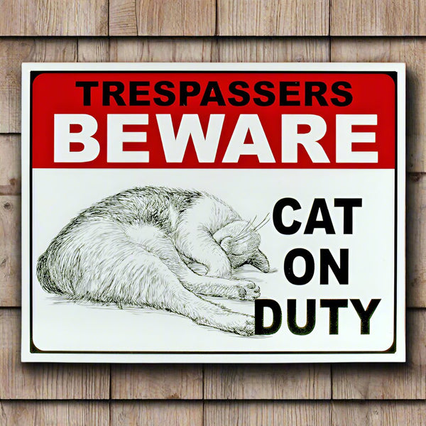 trespassers beware cat on duty tin sign