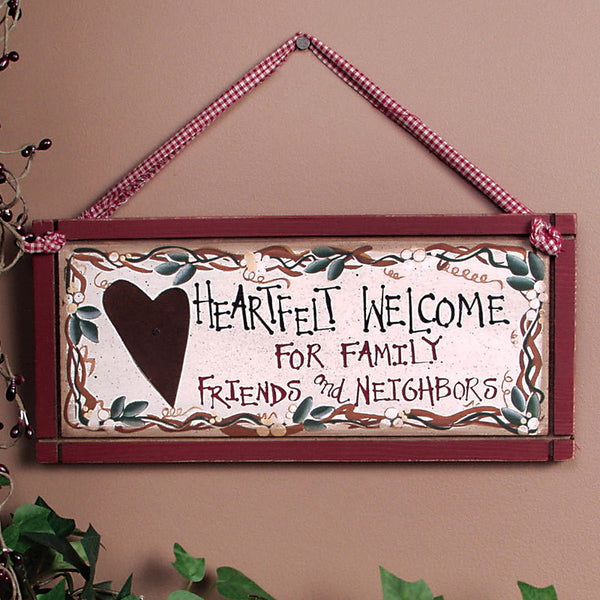 wooden heartfelt welcome sign