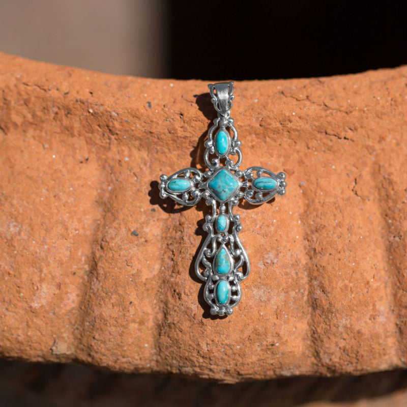ornate turquoise cross pendant