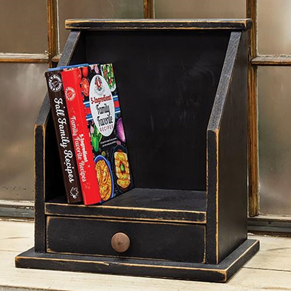 black cookbook or bath cubby with drawer